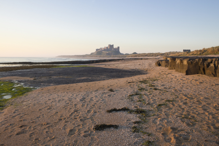 Bamburgh beach and castle from a distance