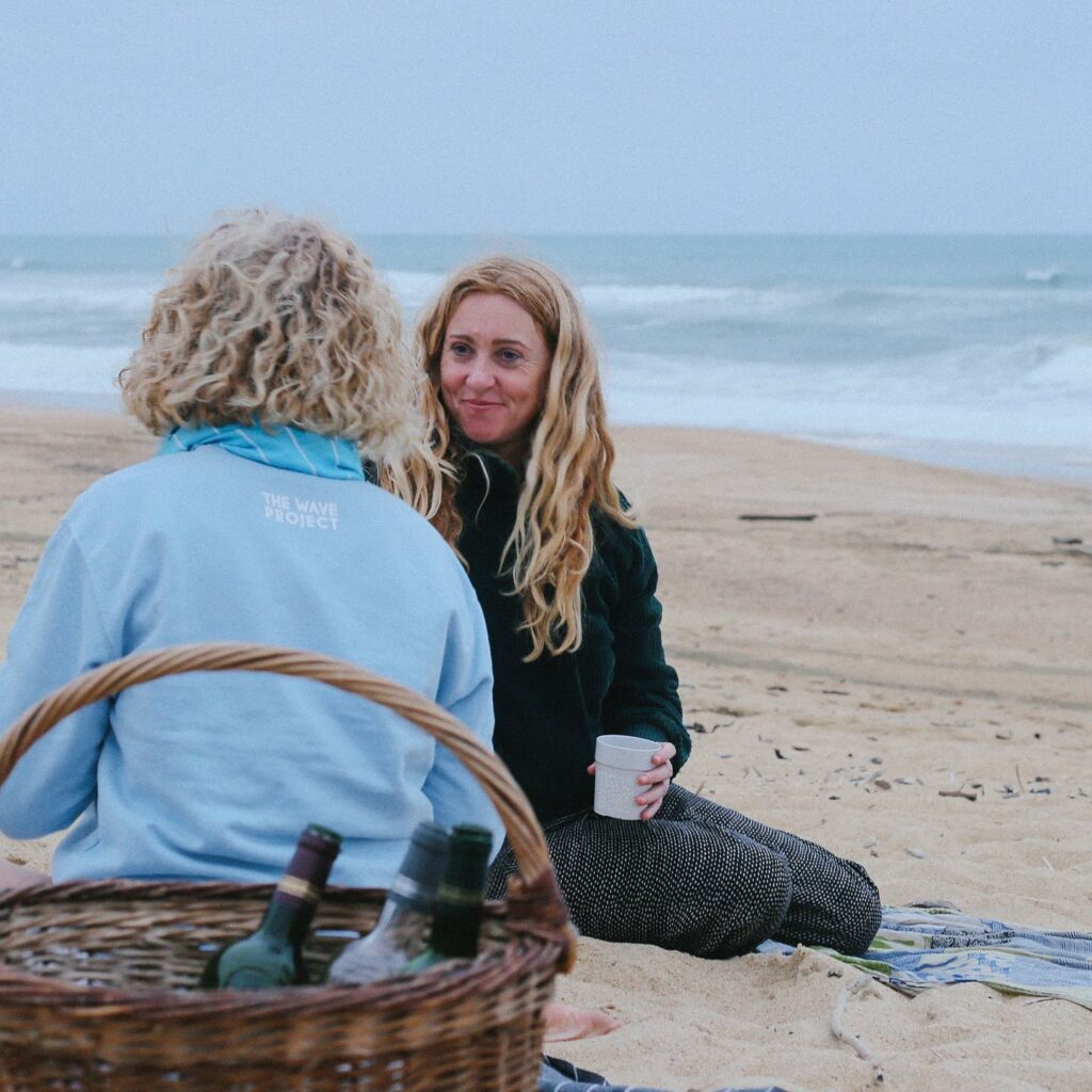 surf sistas - surf retreat on beach