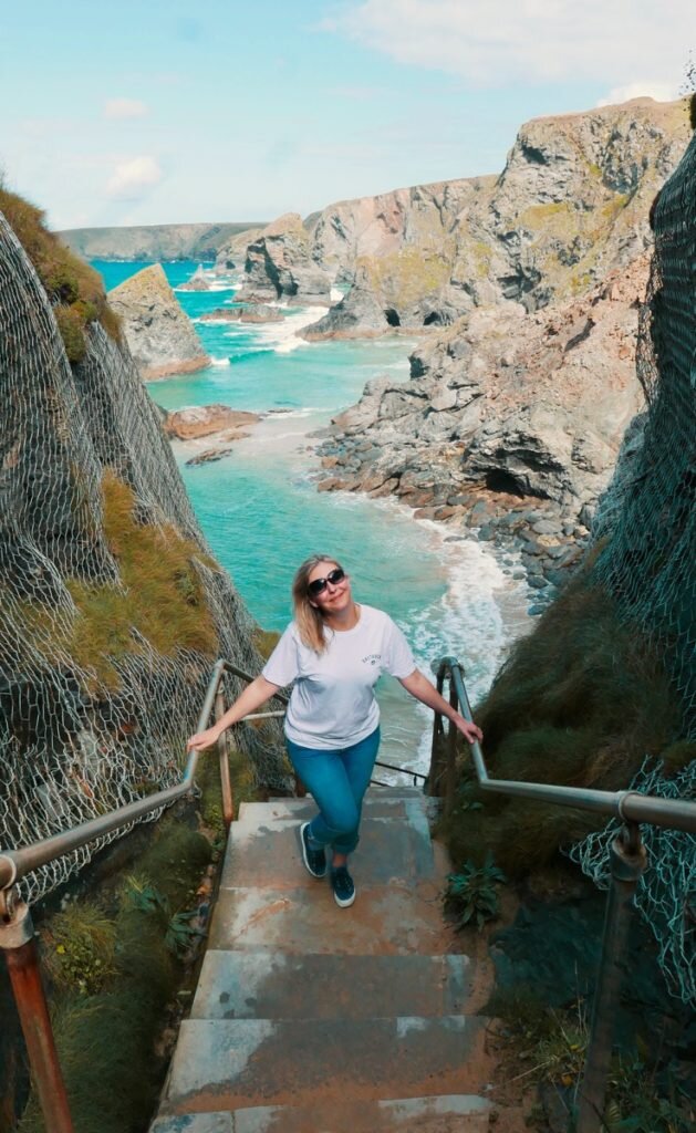 Climbing Bedruthen steps on a girls weekend in cornwall