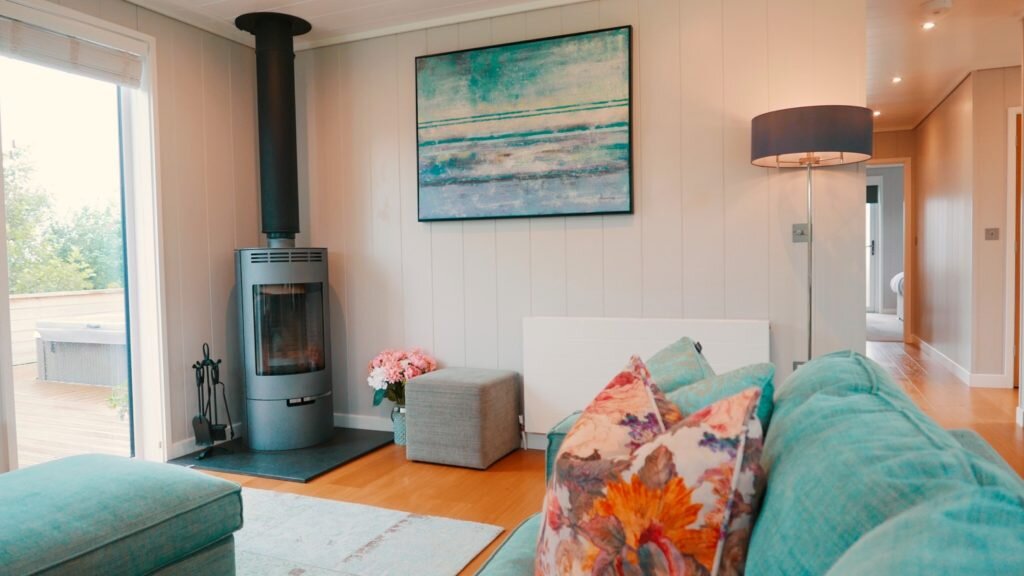 Strawberryfield Eco Lodges in Somerset - lounge and log burner