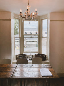 beer and gin house in brecon - inside table and chairs