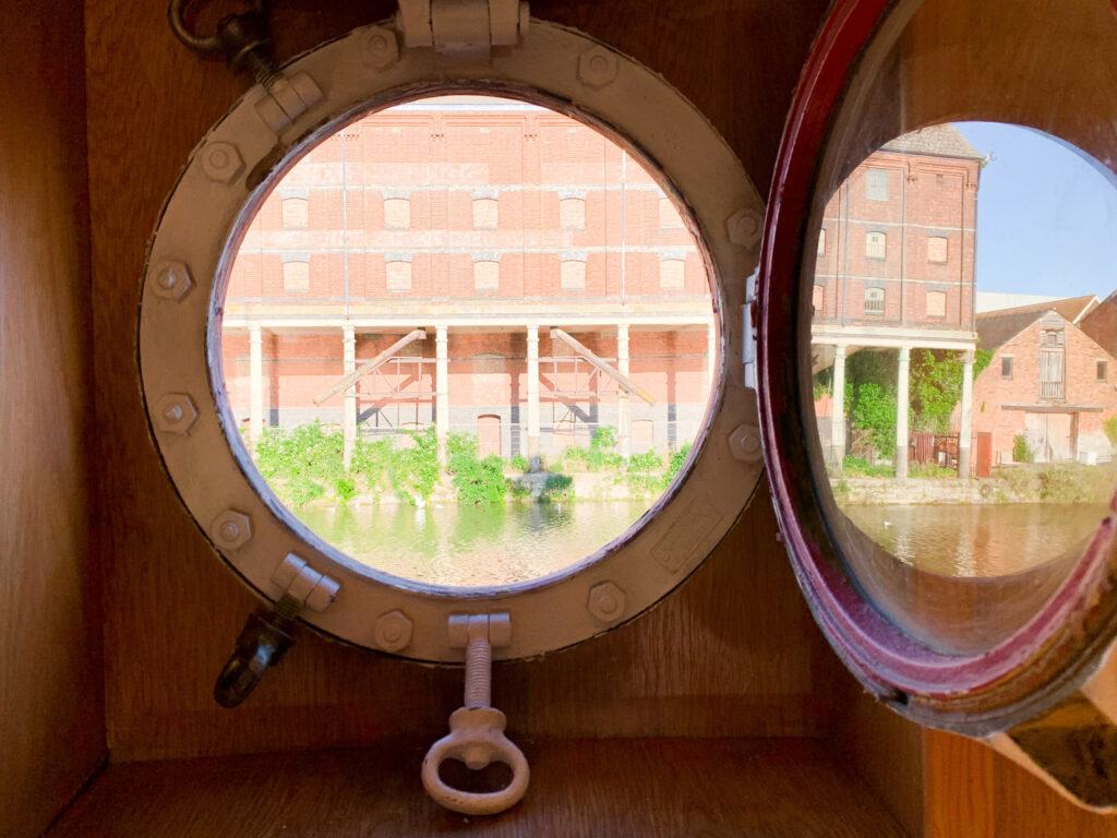 SULA-Lightship-Gloucester-Docks water through porthole