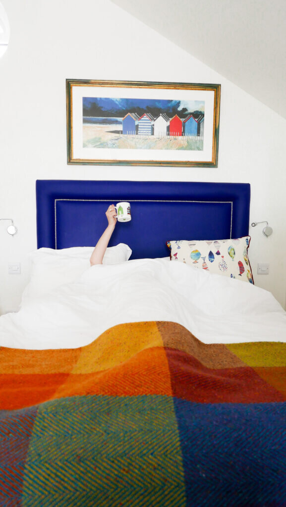 beachcroft-beach-huts: bedroom and cup
