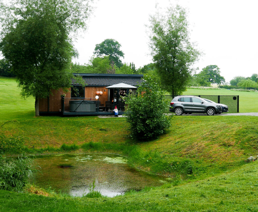 log cabins Shropshire - outside riverside cabin