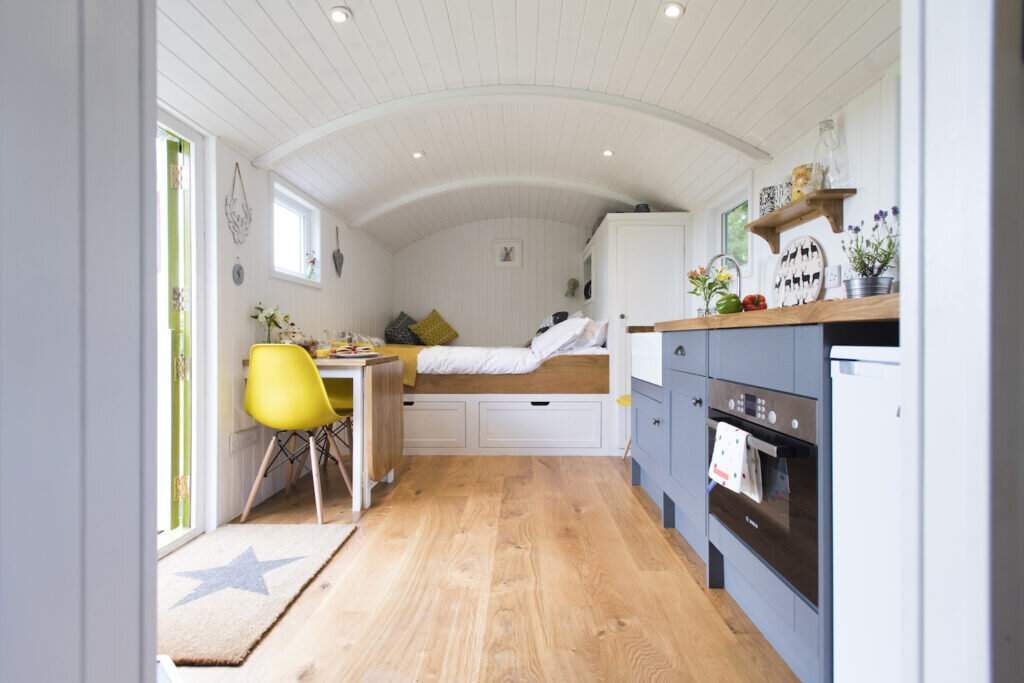 Glamping in Cornwall with a hot tub - The Lion's Den Shepherd's Hut - inside kitchen