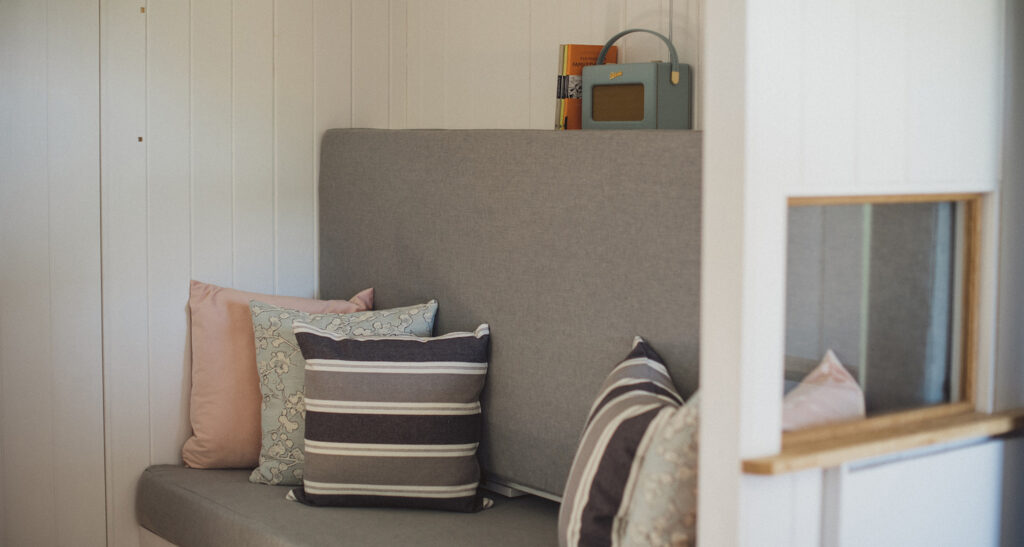 long view lodge glamping in sussex - inside sofa