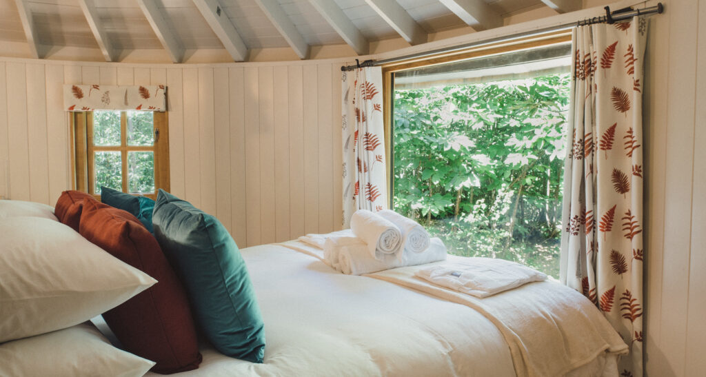 glamping sussex- the roundhouse bedroom and window