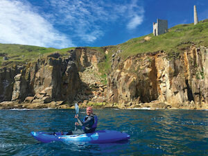 Kayak-blue-and-cliffs-large-1536x1152-1