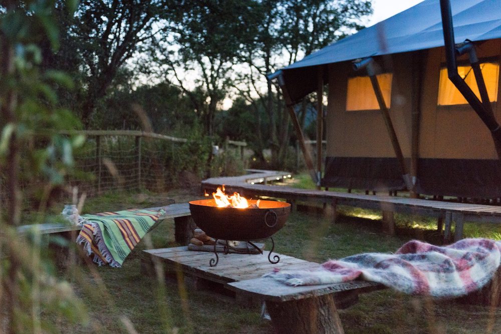 Upsticks glamping in Malvern Worcestershire - safari tent at night