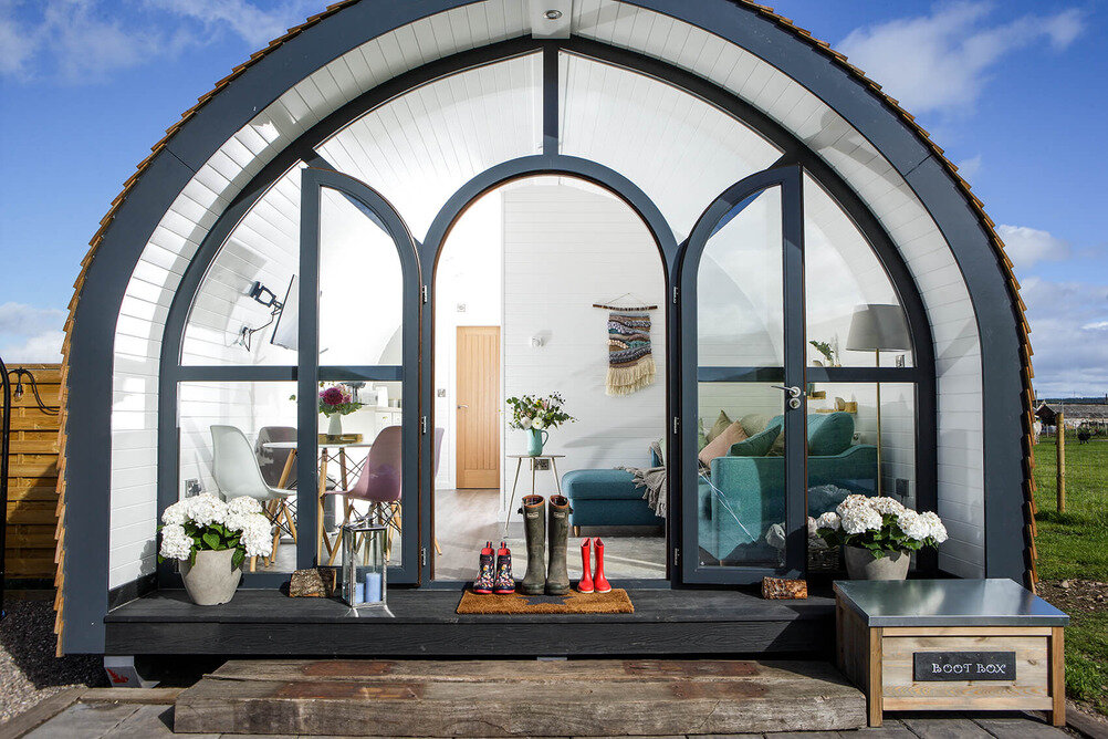 Glass-fronted glamping pod
