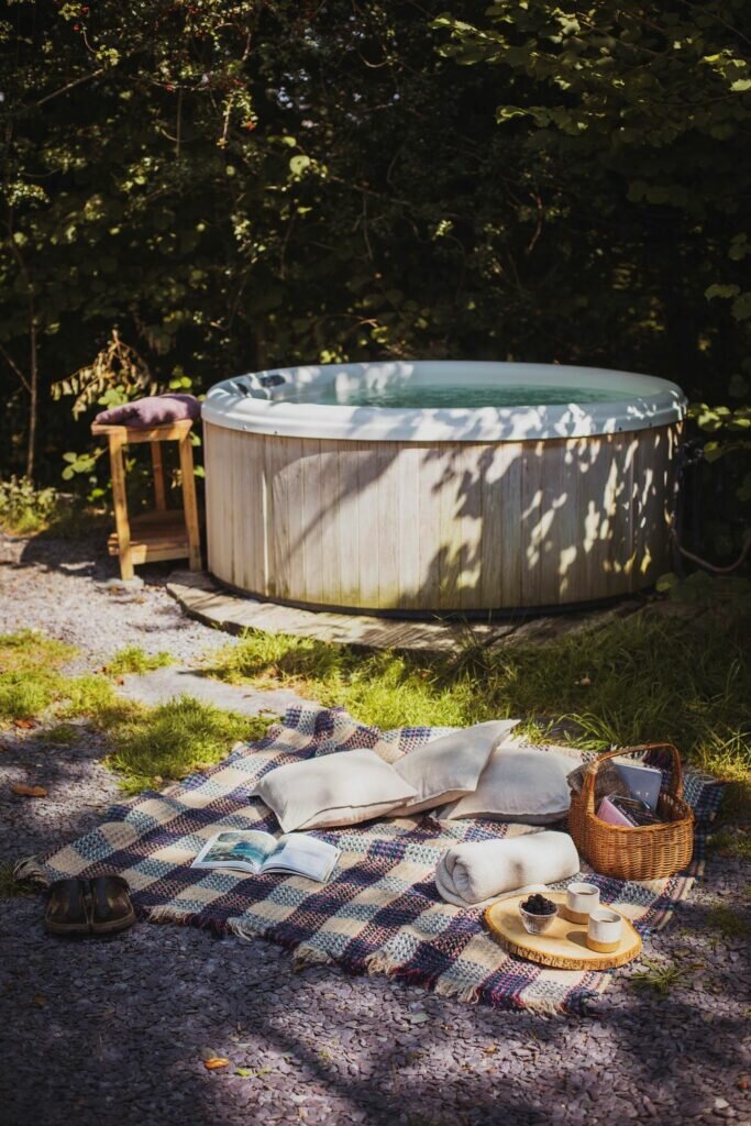 Yurt in Wales: hot tub at The Welsh Farm