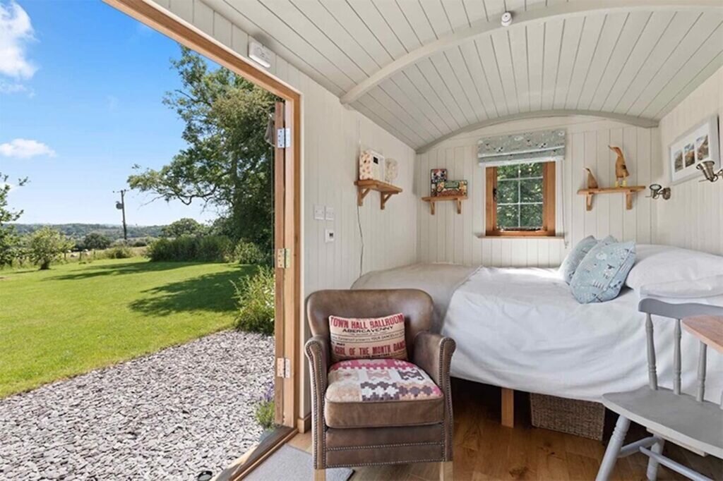 Shepherds Hut Wales - Cromwell's Hideaway - inside bed