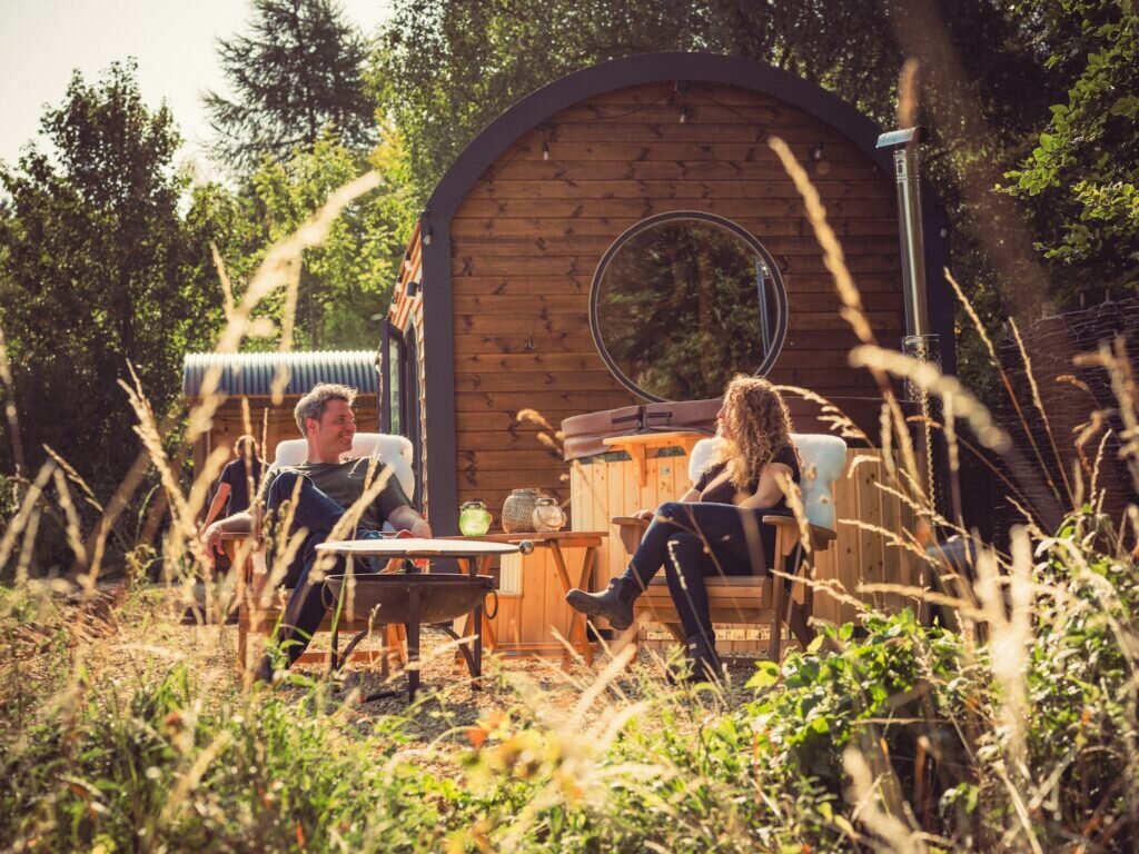 coupe relaxing outside in the nook glamping cheltenham